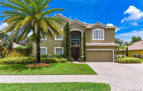 Photo of 2029 SW Panther Trace, Stuart, FL 34997 (MLS # M20056094)