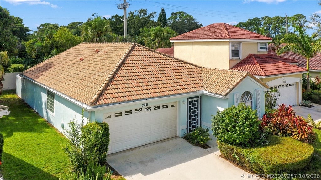 Photo of 2241 SW Olympic Club Terrace, Palm City, FL 34990 (MLS # M20057257)