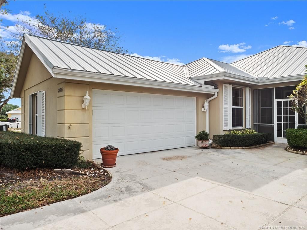 Photo of 2035 SW Mayflower Drive, Palm City, FL 34990 (MLS # M20042360)