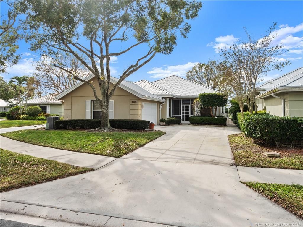 Photo of 2035 SW Mayflower Drive, Palm City, FL 34990 (MLS # M20042360)