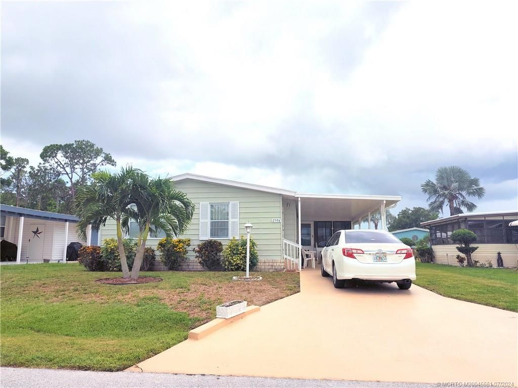 Photo of 2594 SW Pontiac Place, Stuart, FL 34997 (MLS # M20045661)