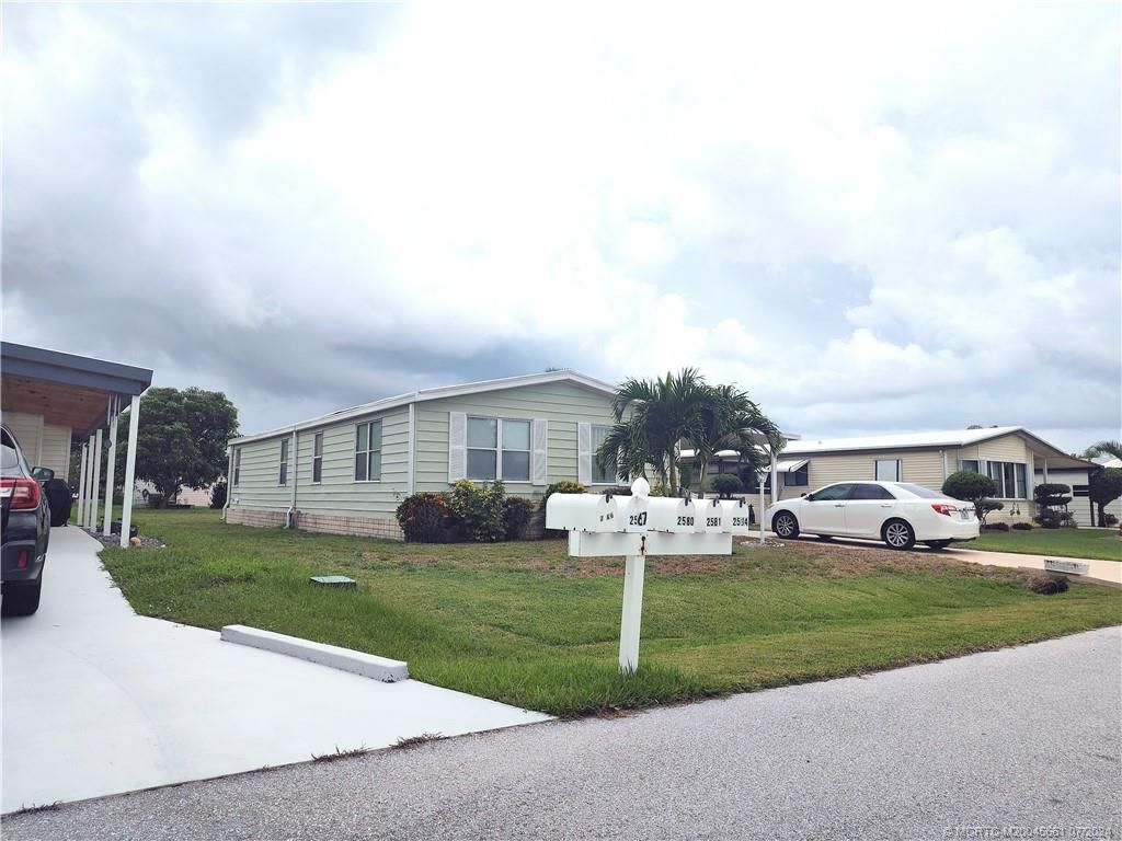 Photo of 2594 SW Pontiac Place, Stuart, FL 34997 (MLS # M20045661)