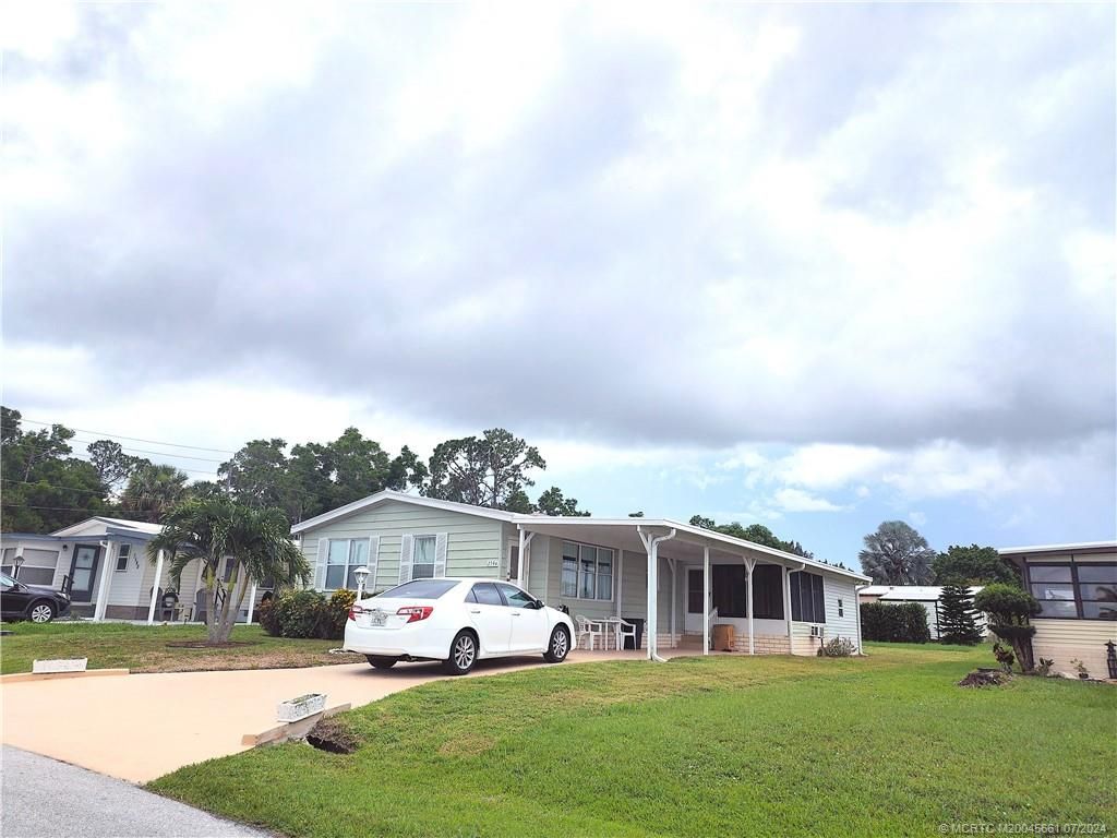 Photo of 2594 SW Pontiac Place, Stuart, FL 34997 (MLS # M20045661)