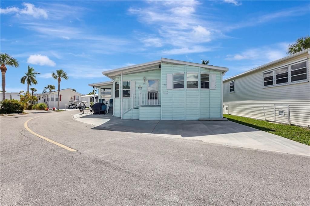 Photo of 511 Nettles Boulevard, Jensen Beach, FL 34957 (MLS # M20052077)