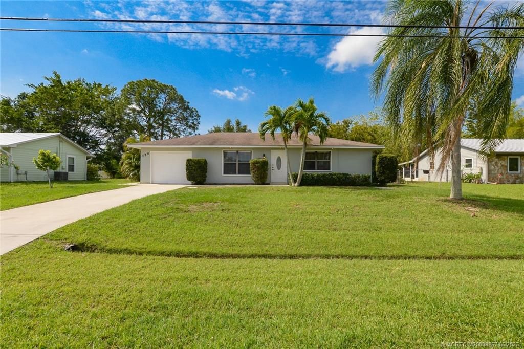 Photo of 350 SE Evans Avenue, Port Saint Lucie, FL 34984 (MLS # M20039257)