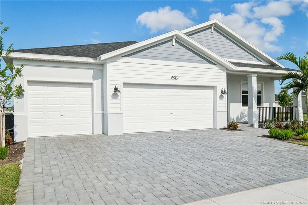 Photo of 6513 NW Cloverdale Avenue, Port Saint Lucie, FL 34987 (MLS # M20046250)