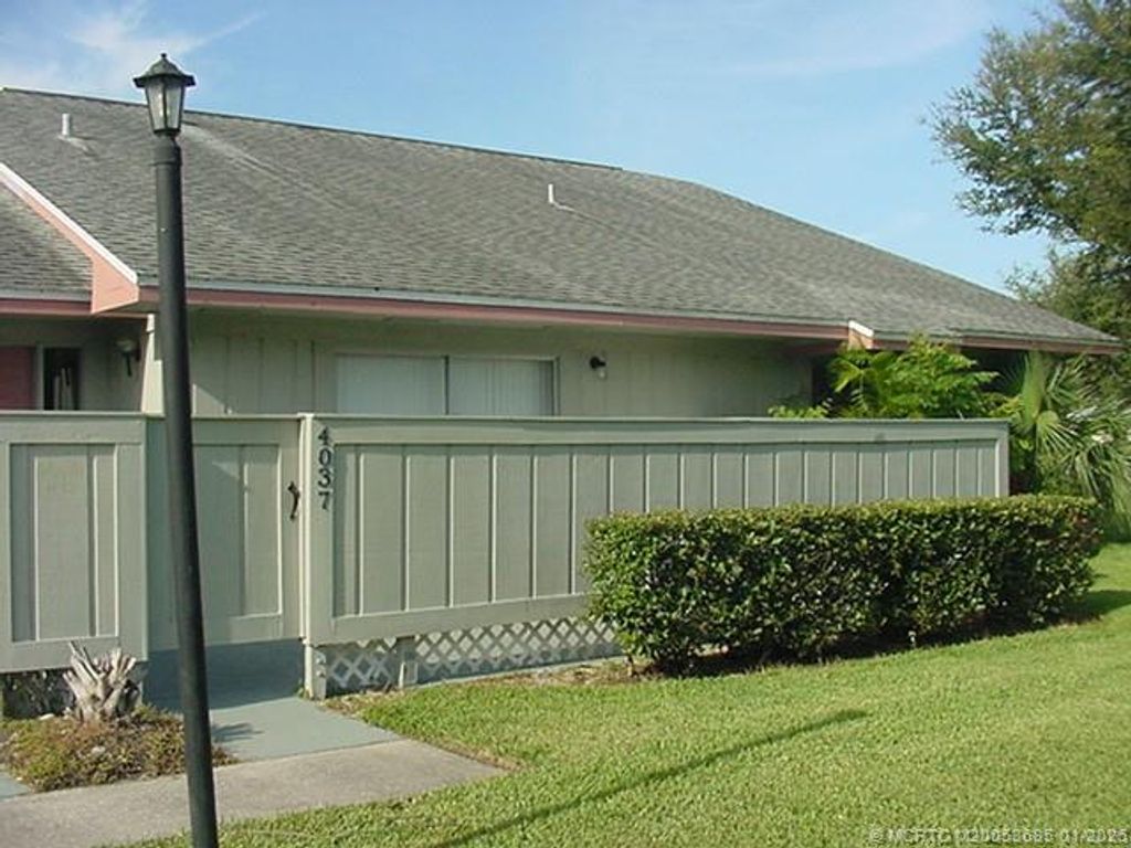 Photo of 4037 NW Cinnamon Tree Circle, Jensen Beach, FL 34957 (MLS # M20053685)