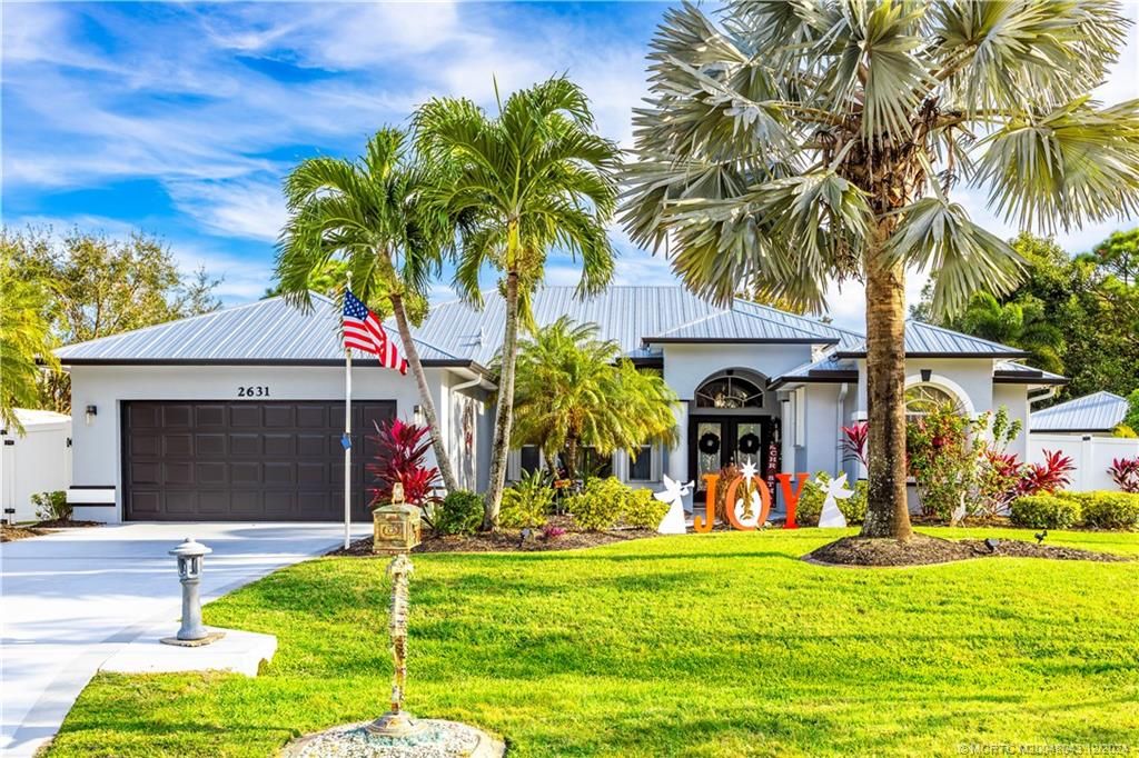 Photo of 2631 SE Opal Circle, Port Saint Lucie, FL 34952 (MLS # M20048043)