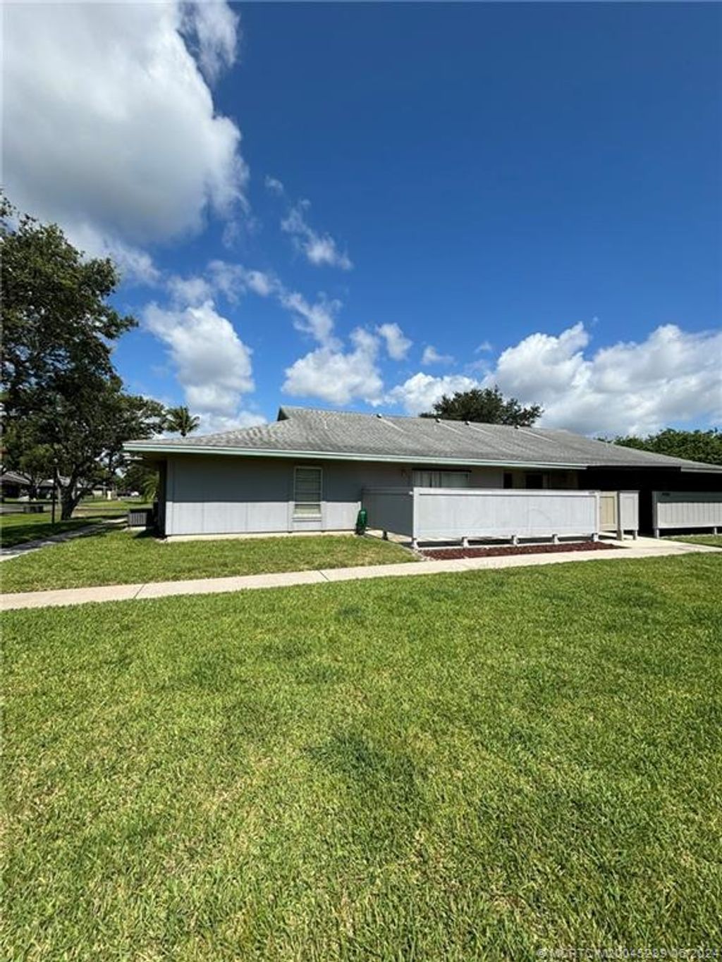 Photo of 4055 NW Cinnamon Tree Circle, Jensen Beach, FL 34957 (MLS # M20045289)