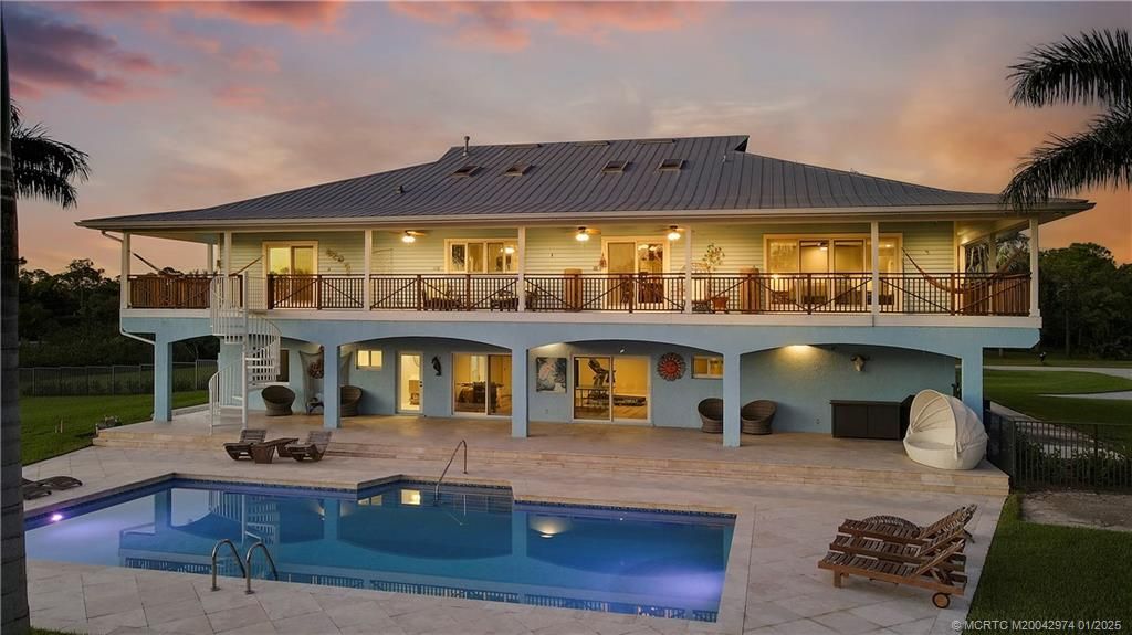 Photo of 11555 SW Meadowlark Circle, Stuart, FL 34997 (MLS # M20042974)