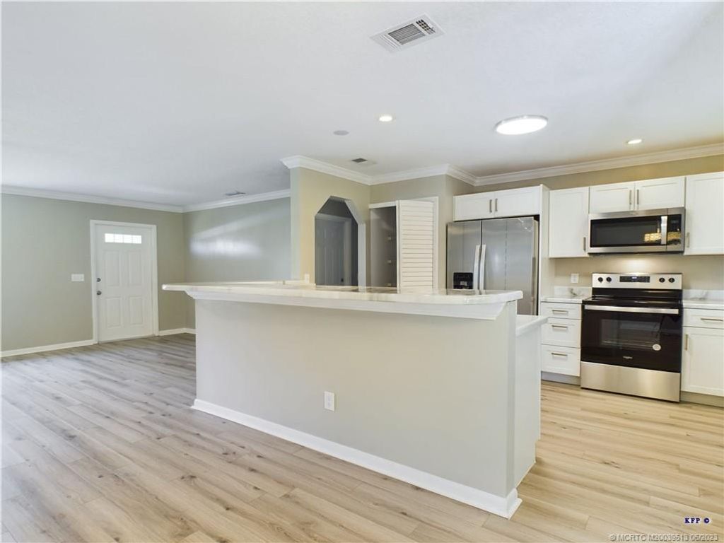 Photo of 705 NE Vanda Terrado Street, Jensen Beach, FL 34957 (MLS # M20039513)