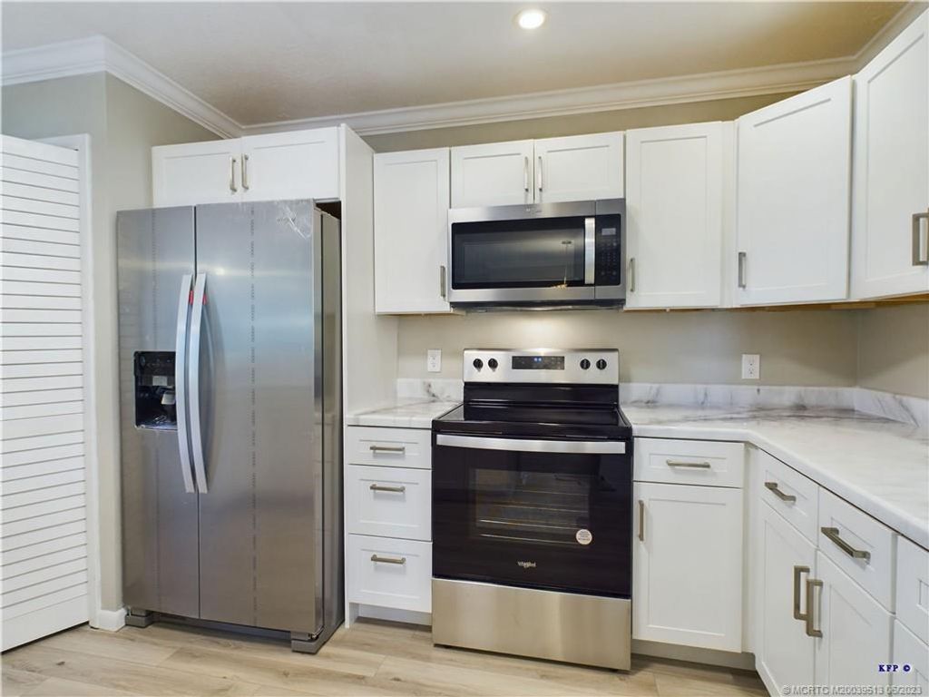 Photo of 705 NE Vanda Terrado Street, Jensen Beach, FL 34957 (MLS # M20039513)