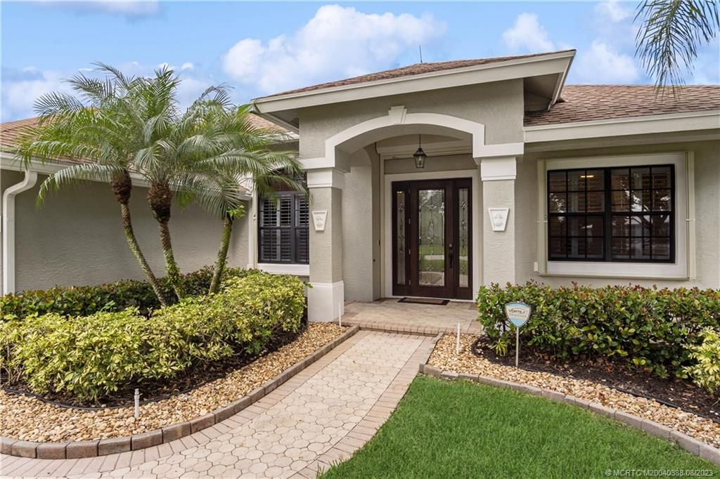 Photo of 8049 SW Yachtsmans Drive, Stuart, FL 34997 (MLS # M20040388)