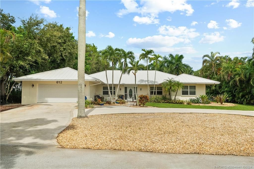 Photo of 612 NW Sunset Drive, Stuart, FL 34994 (MLS # M20046941)