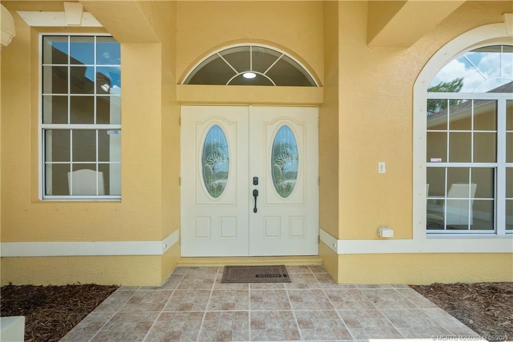 Photo of 9409 Orange Avenue, Fort Pierce, FL 34945 (MLS # M20039448)