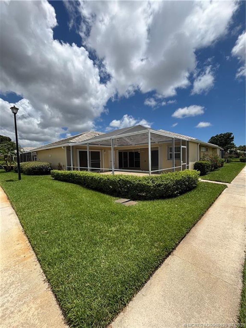 Photo of 1215 NW Sun Terrace Circle #D, Port Saint Lucie, FL 34986 (MLS # M20050920)