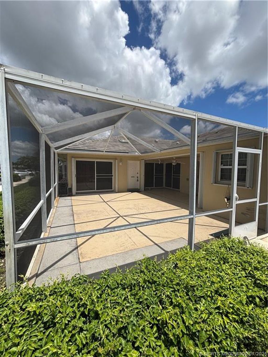 Photo of 1215 NW Sun Terrace Circle #D, Port Saint Lucie, FL 34986 (MLS # M20050920)