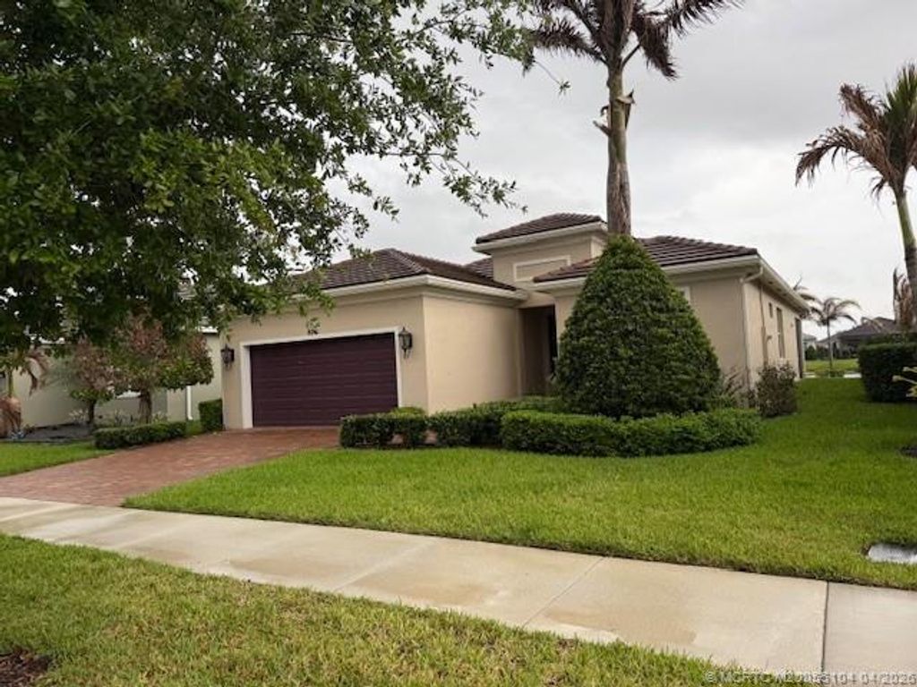 Photo of 8741 SW Vico Way, Port Saint Lucie, FL 34987 (MLS # M20055104)