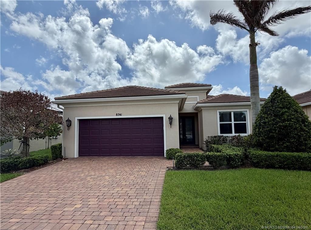 Photo of 8741 SW Vico Way, Port Saint Lucie, FL 34987 (MLS # M20055104)