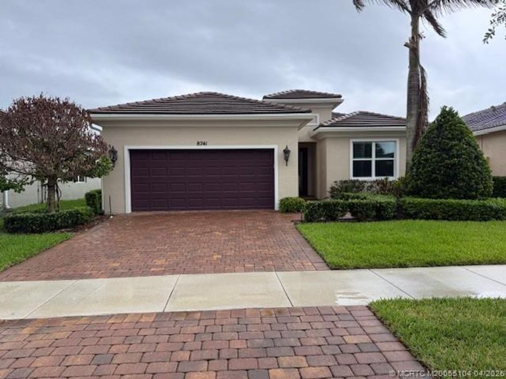 Photo of 8741 SW Vico Way, Port Saint Lucie, FL 34987 (MLS # M20055104)