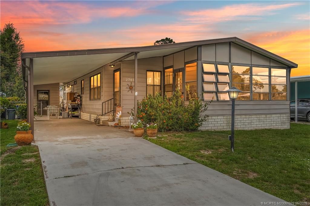 Photo of 2701 SW Monarch Trail, Stuart, FL 34997 (MLS # M20051029)