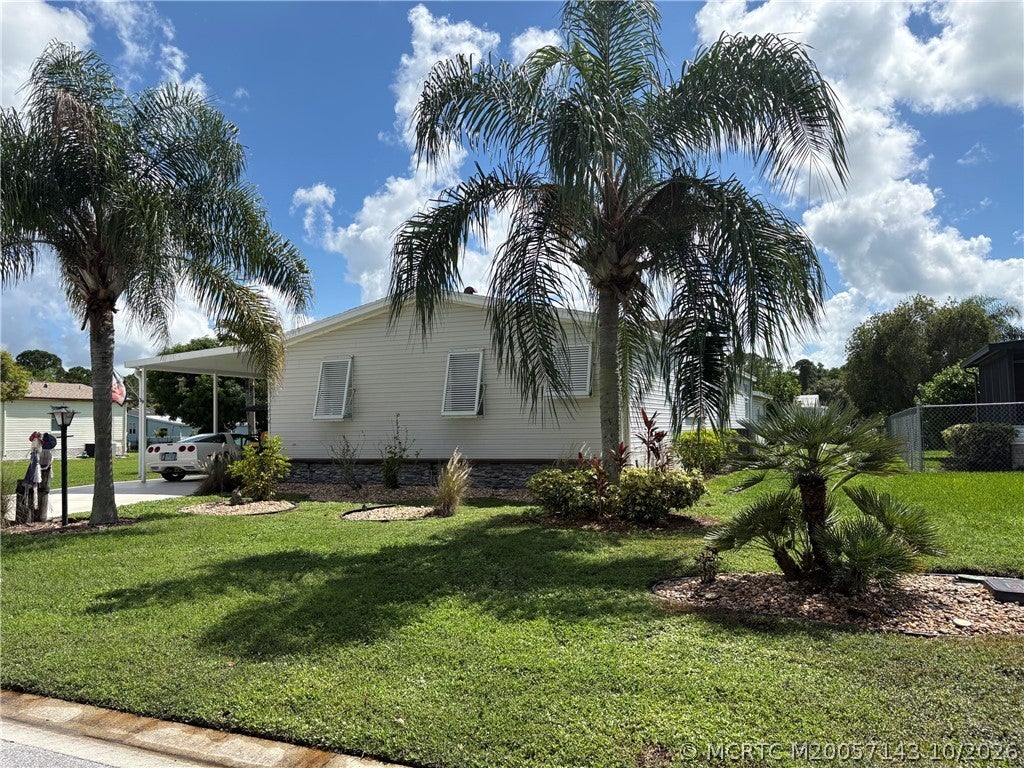 Photo of 2474 SW Versailles Terrace, Stuart, FL 34997 (MLS # M20057143)