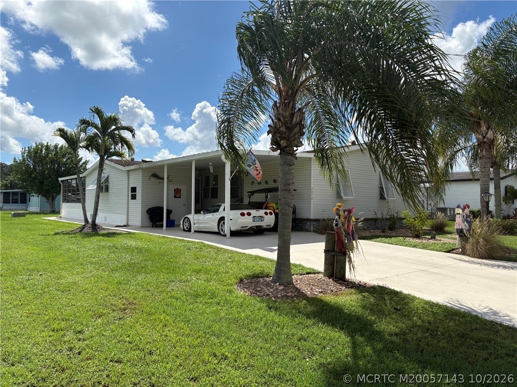 Photo of 2474 SW Versailles Terrace, Stuart, FL 34997 (MLS # M20057143)