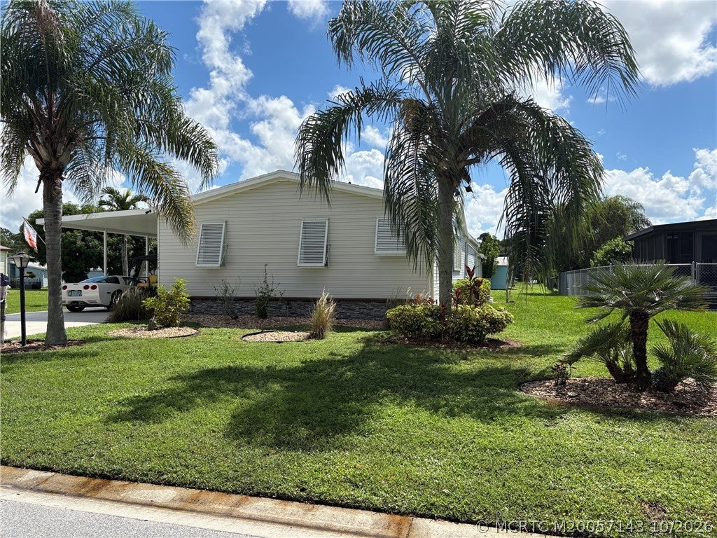 Photo of 2474 SW Versailles Terrace, Stuart, FL 34997 (MLS # M20057143)