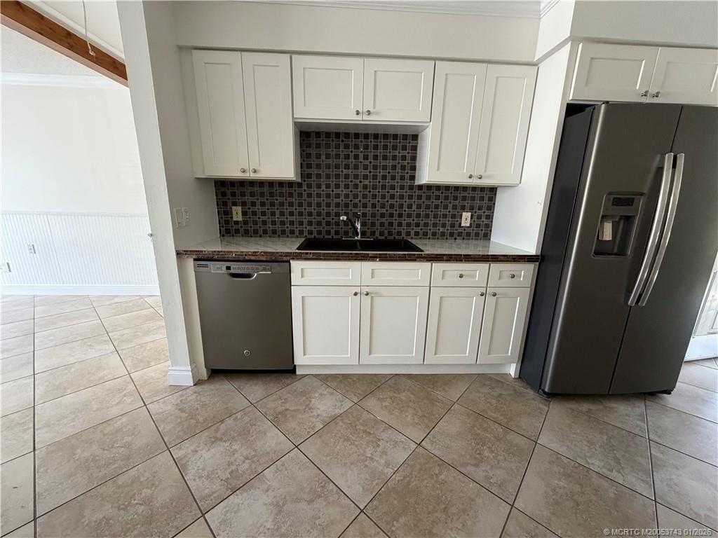Photo of 820 NW 10th Terrace, Stuart, FL 34994 (MLS # M20053743)