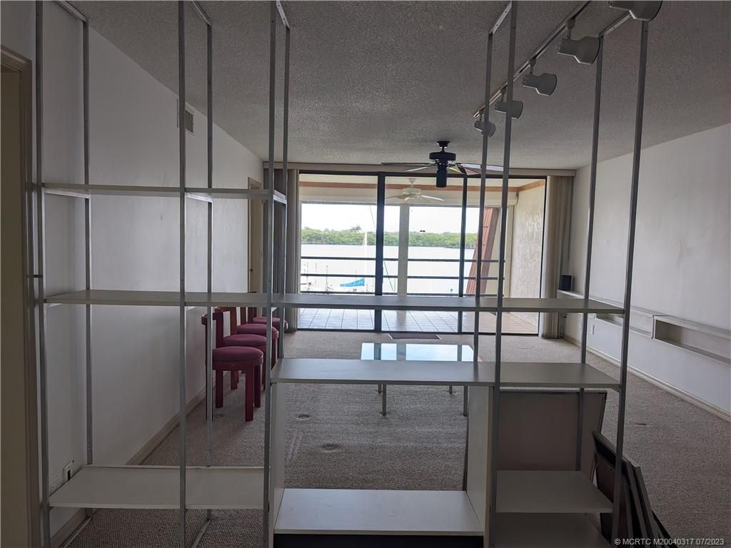 Photo of 3100 SE Pruitt Road #E301, Port Saint Lucie, FL 34952 (MLS # M20040317)