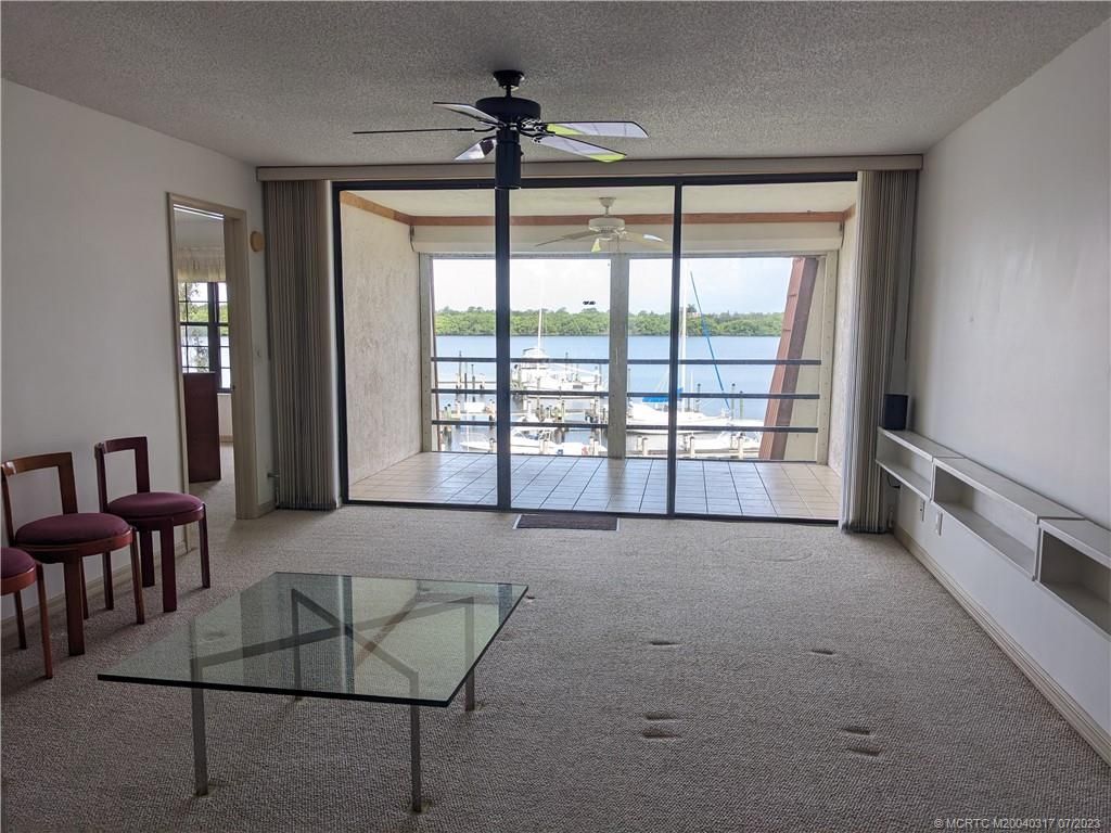 Photo of 3100 SE Pruitt Road #E301, Port Saint Lucie, FL 34952 (MLS # M20040317)