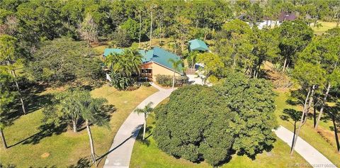 Photo of 10941 SW Hawkview Circle, Stuart, FL 34997 (MLS # M20053877)