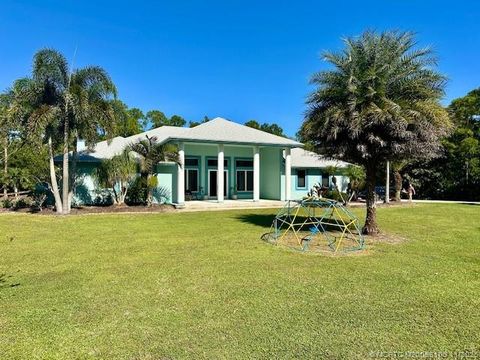 Photo of 11666 SW Meadowlark Circle, Stuart, FL 34997 (MLS # M20053100)