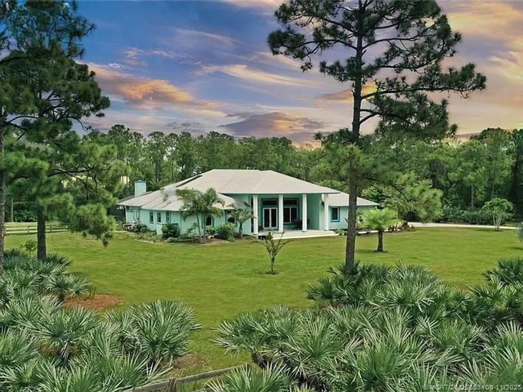 Photo of 11666 SW Meadowlark Circle, Stuart, FL 34997 (MLS # M20053100)