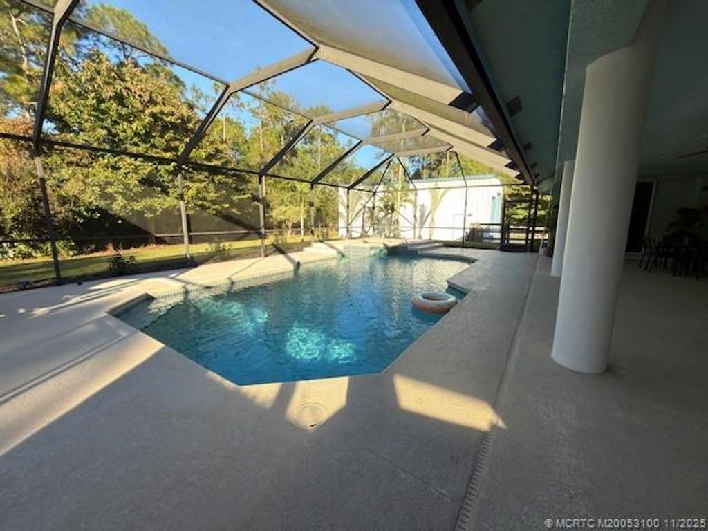 Photo of 11666 SW Meadowlark Circle, Stuart, FL 34997 (MLS # M20053100)