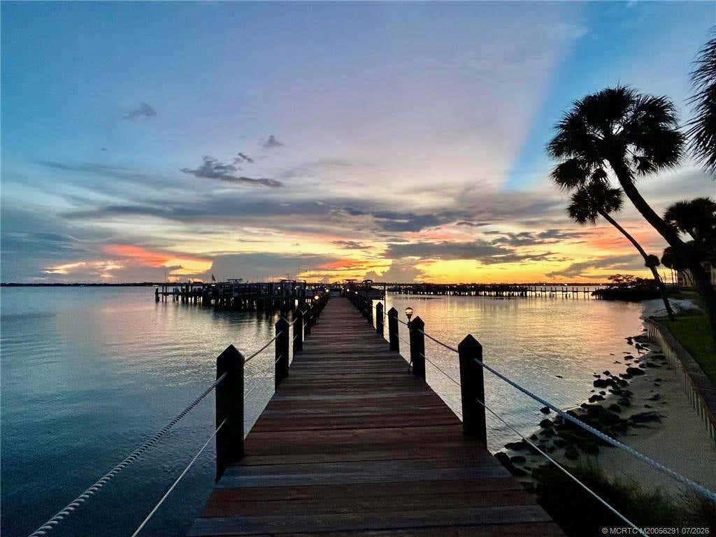 Photo of 4540 NE Sandpebble Trace #203, Stuart, FL 34996 (MLS # M20056291)