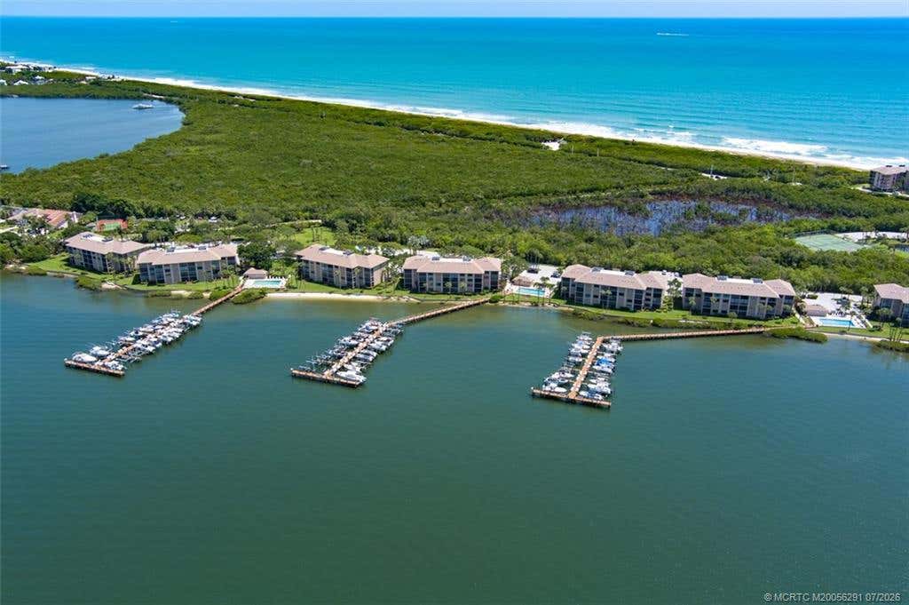 Photo of 4540 NE Sandpebble Trace #203, Stuart, FL 34996 (MLS # M20056291)