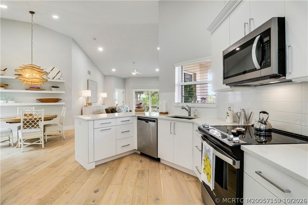 Photo of 2426 SW Foxpoint Trail, Palm City, FL 34990 (MLS # M20057159)