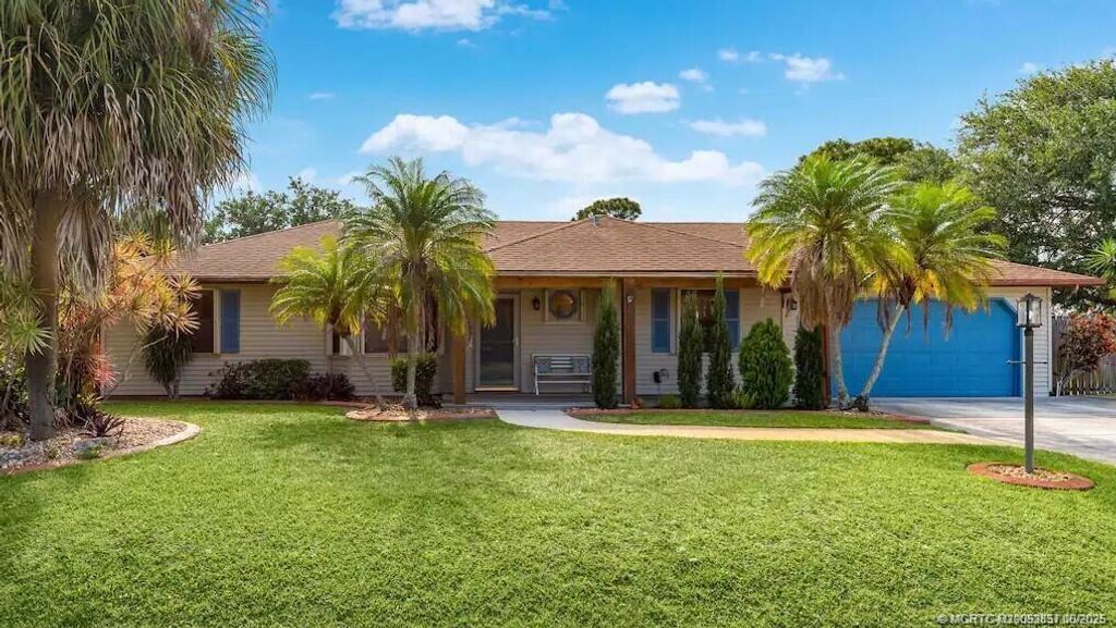 Photo of 2550 SE Calais Street, Port Saint Lucie, FL 34952 (MLS # M20052857)