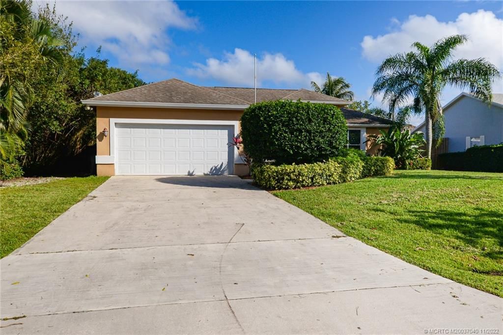 Photo of 2065 SW Beekman Street, Port Saint Lucie, FL 34953 (MLS # M20037040)