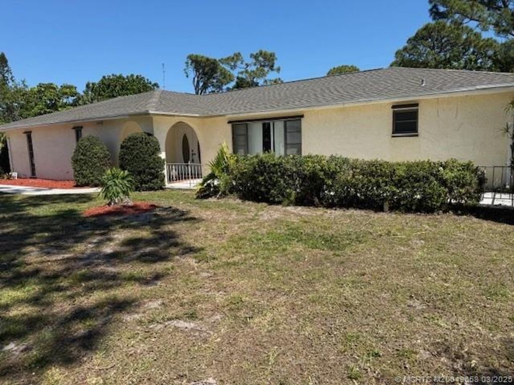 Photo of 2225 SE Adobe Street, Port Saint Lucie, FL 34952 (MLS # M20049658)