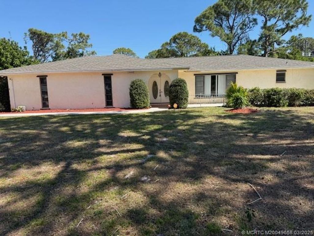 Photo of 2225 SE Adobe Street, Port Saint Lucie, FL 34952 (MLS # M20049658)