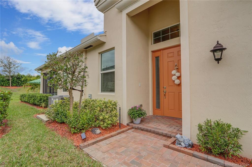 Photo of 12914 SW Lake Fern Circle, Port Saint Lucie, FL 34987 (MLS # M20045951)