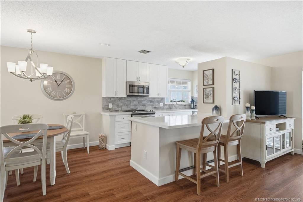 Photo of 1461 NE 14th Court #T49, Jensen Beach, FL 34957 (MLS # M20054073)