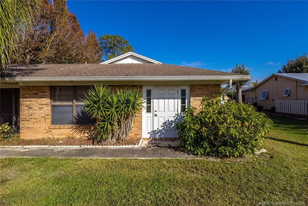 Photo of 2055 SW Cranberry Street, Port Saint Lucie, FL 34953 (MLS # M20054110)