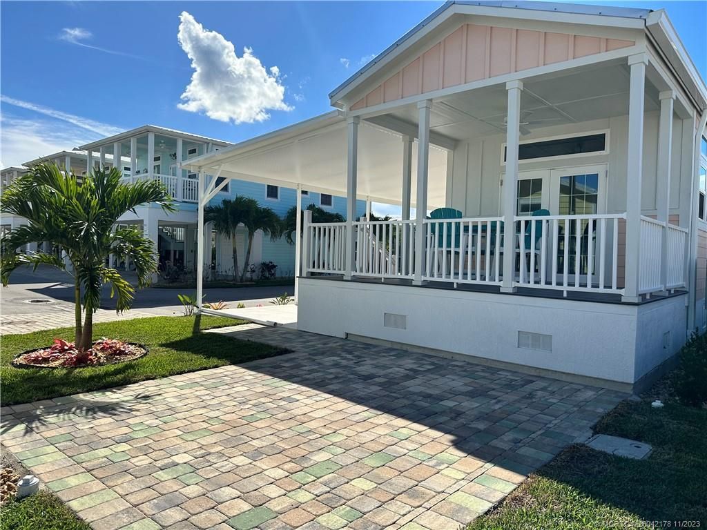 Photo of 218 NE Jetty Way, Jensen Beach, FL 34957 (MLS # M20042178)