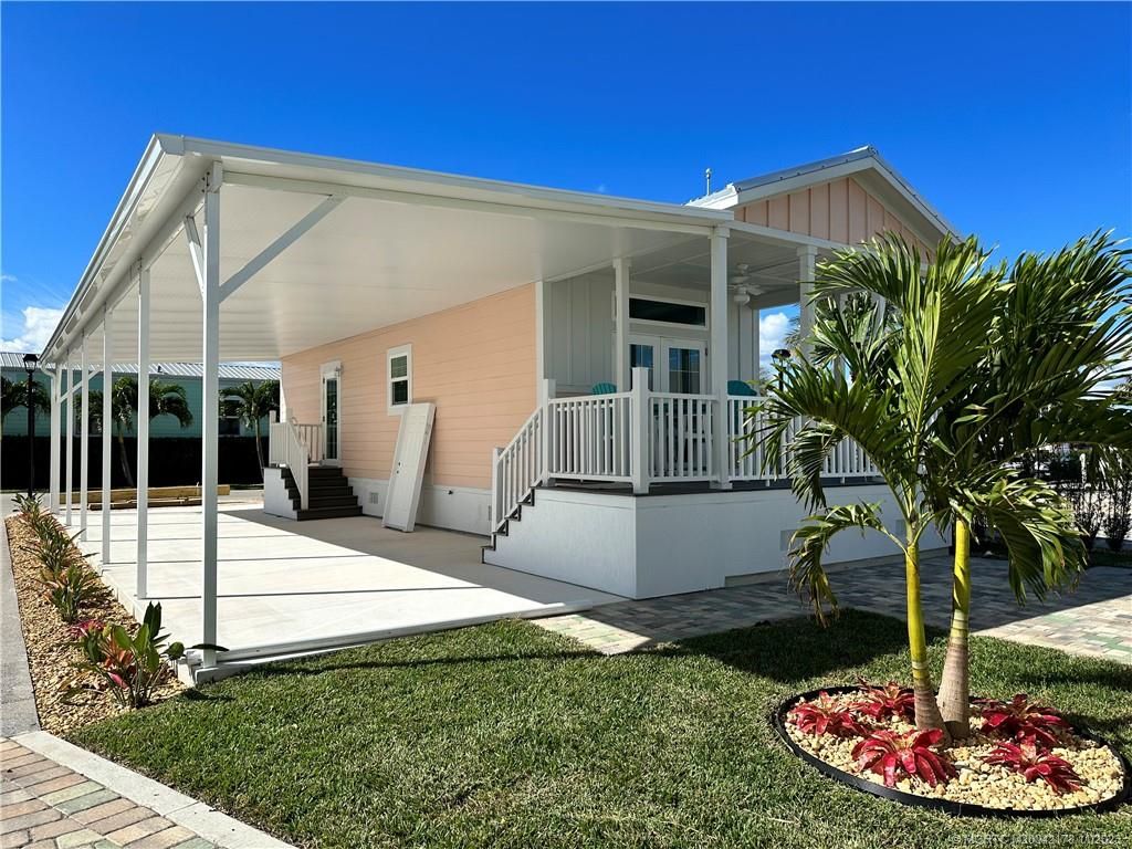 Photo of 218 NE Jetty Way, Jensen Beach, FL 34957 (MLS # M20042178)