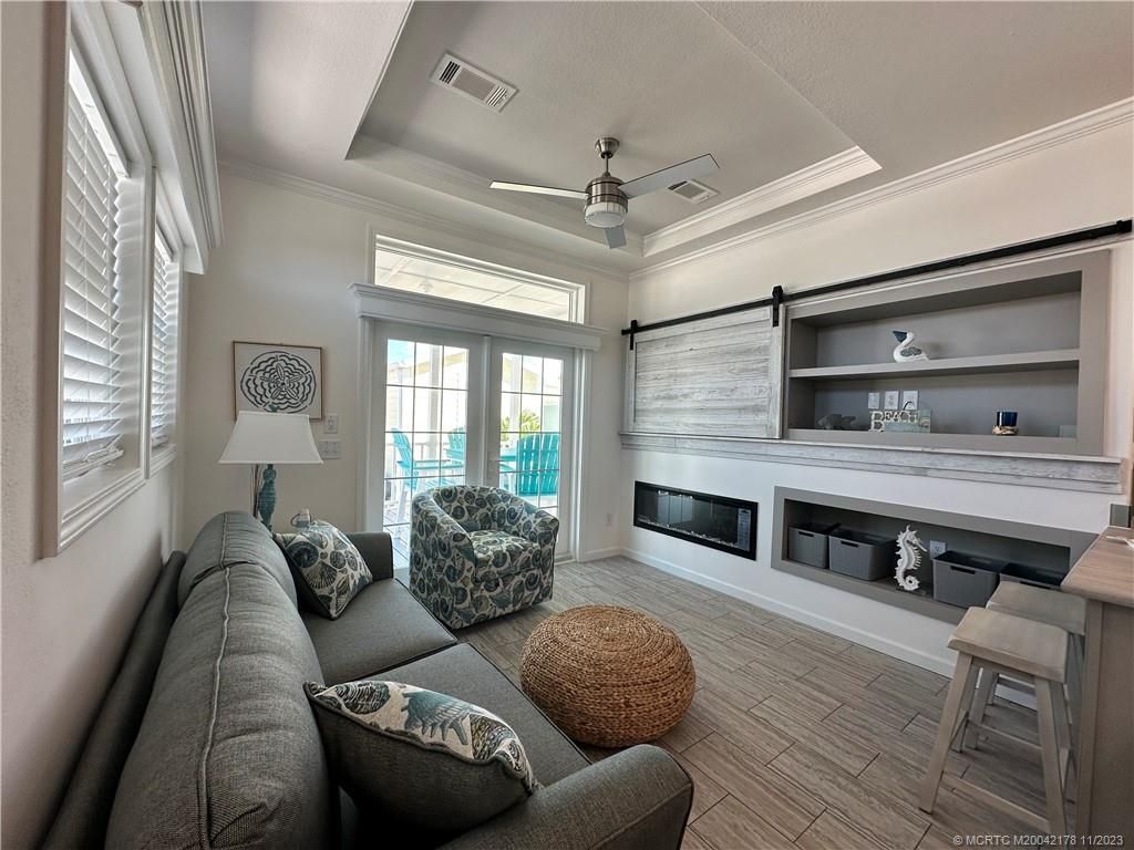 Photo of 218 NE Jetty Way, Jensen Beach, FL 34957 (MLS # M20042178)