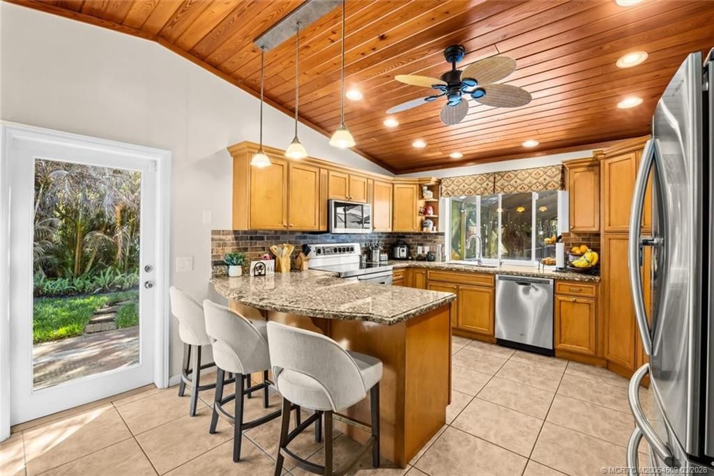 Photo of 1918 SW Crane Creek Avenue, Palm City, FL 34990 (MLS # M20054509)