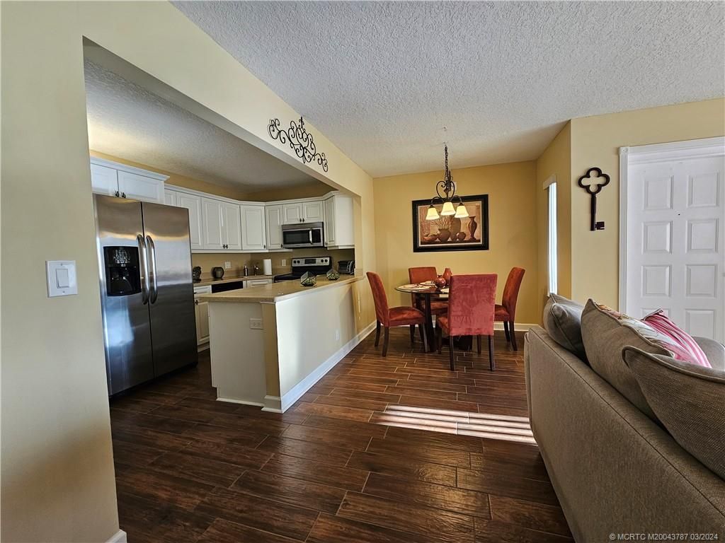 Photo of 1635 SW Silver Pine Way #109-F1, Palm City, FL 34990 (MLS # M20043787)